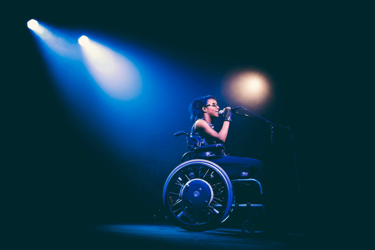 singer in wheel chair